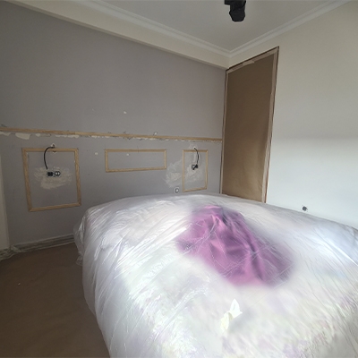 reparación de pared cama